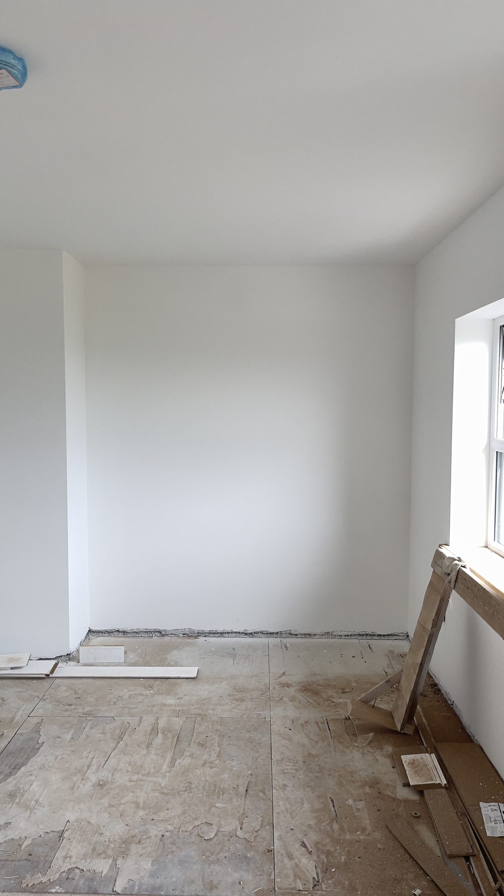 White shaker kitchen with a blue island (before) - fitted by Kitchen Hero