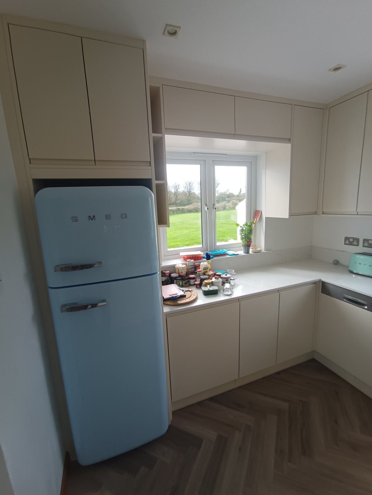 Cream handleless kitchen Cream handleless kitchen (finished) - fitted by Kitchen Hero