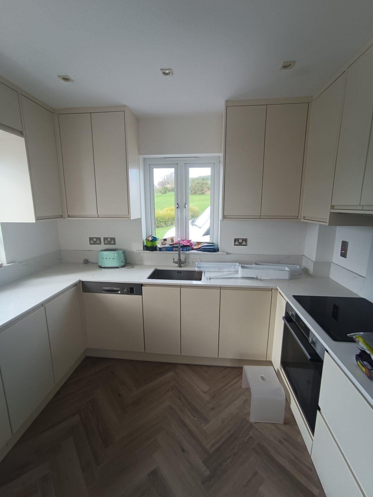 Cream handleless kitchen Cream handleless kitchen (finished) - fitted by Kitchen Hero