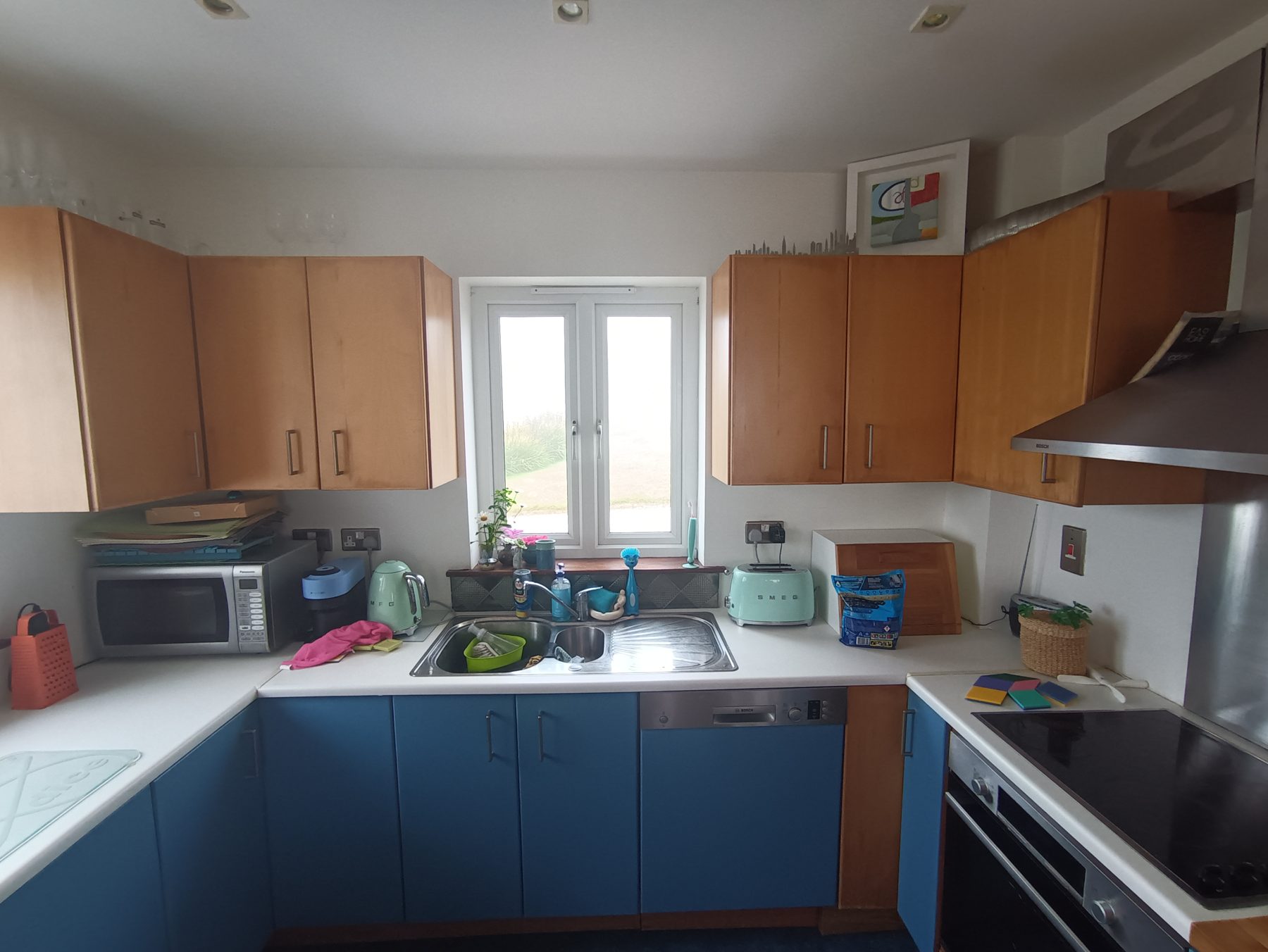 Cream handleless kitchen Cream handleless kitchen (before) - fitted by Kitchen Hero