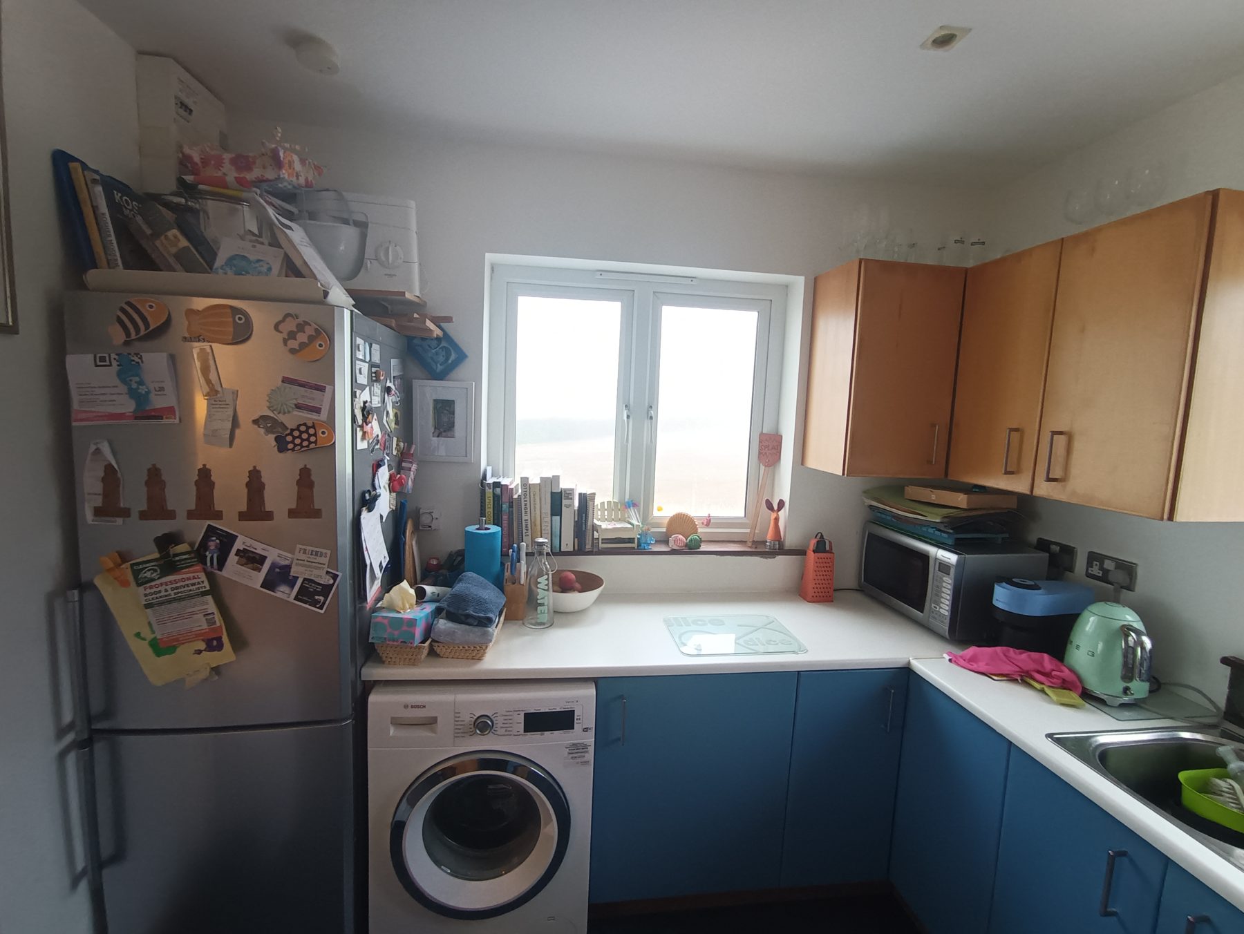 Cream handleless kitchen Cream handleless kitchen (before) - fitted by Kitchen Hero
