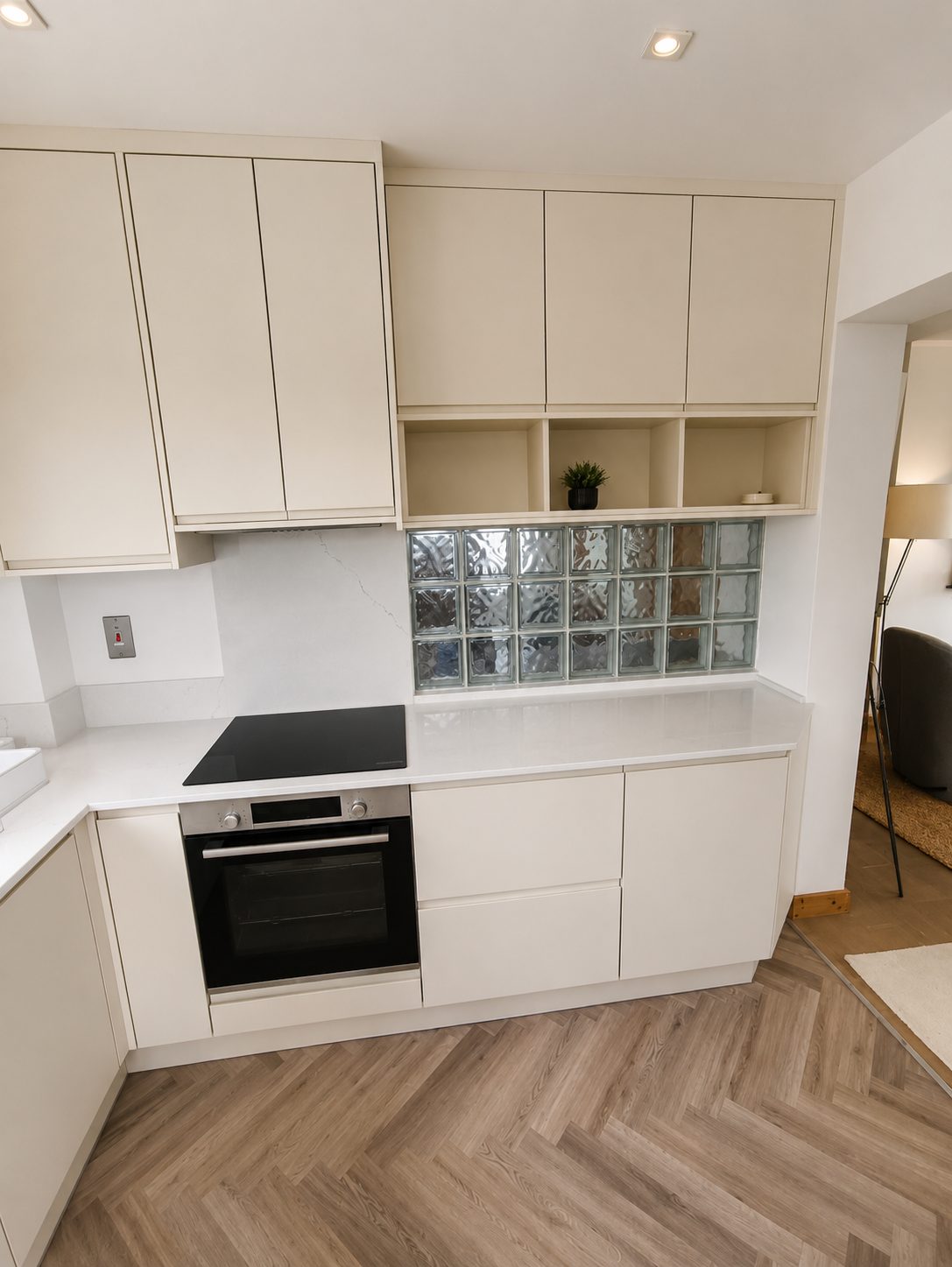Cream handleless kitchen (finished) - fitted by Kitchen Hero
