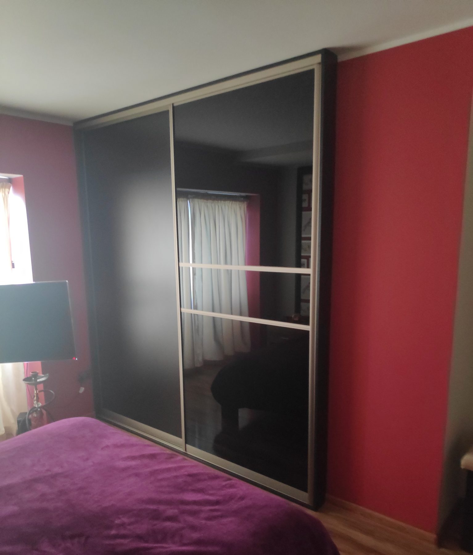 Mirrored sliding wardrobe (finished) - fitted by Kitchen Hero