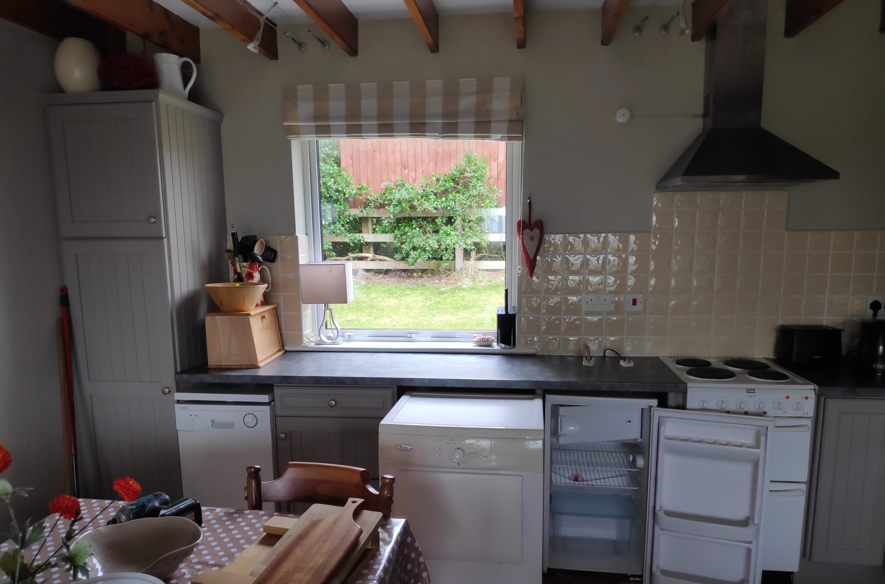 Grey kitchen under the beams (mid-fit) - fitted by Kitchen Hero