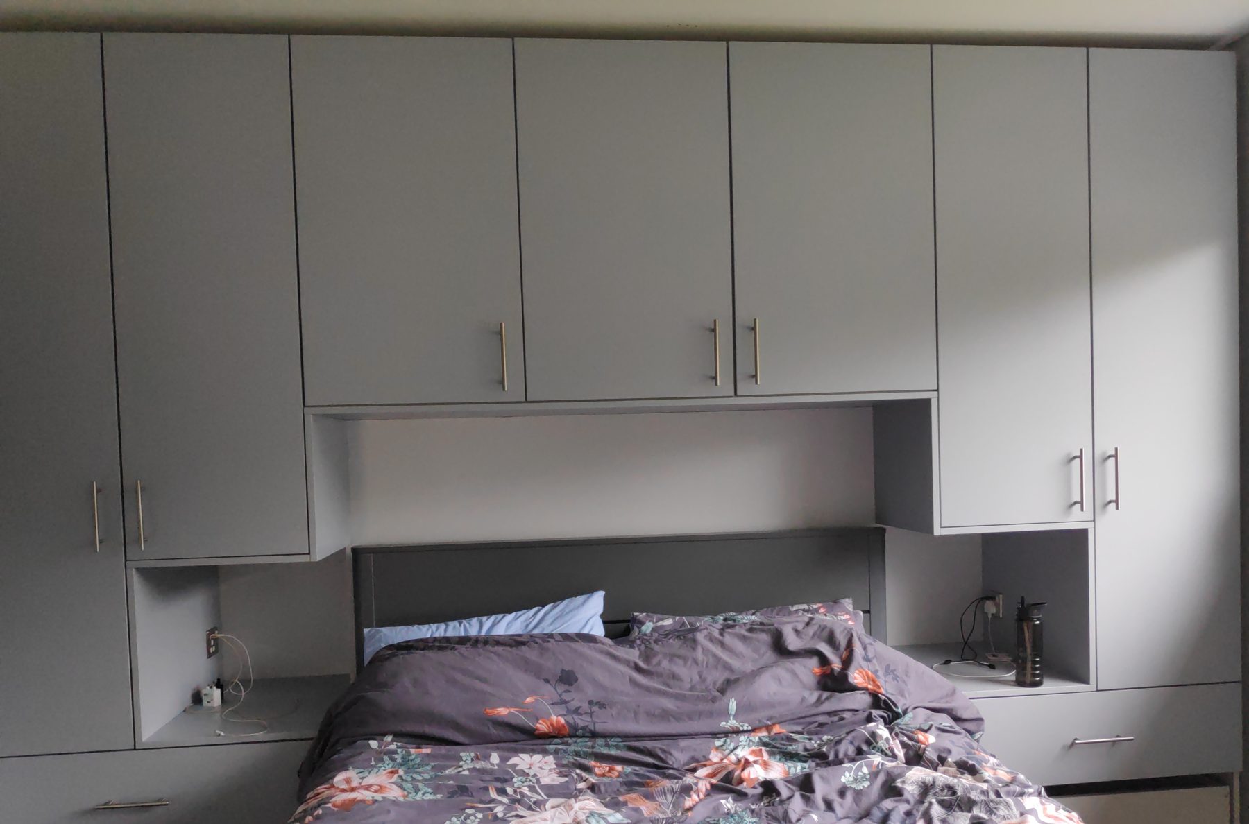 Grey overbed wardrobes (finished) - fitted by Kitchen Hero