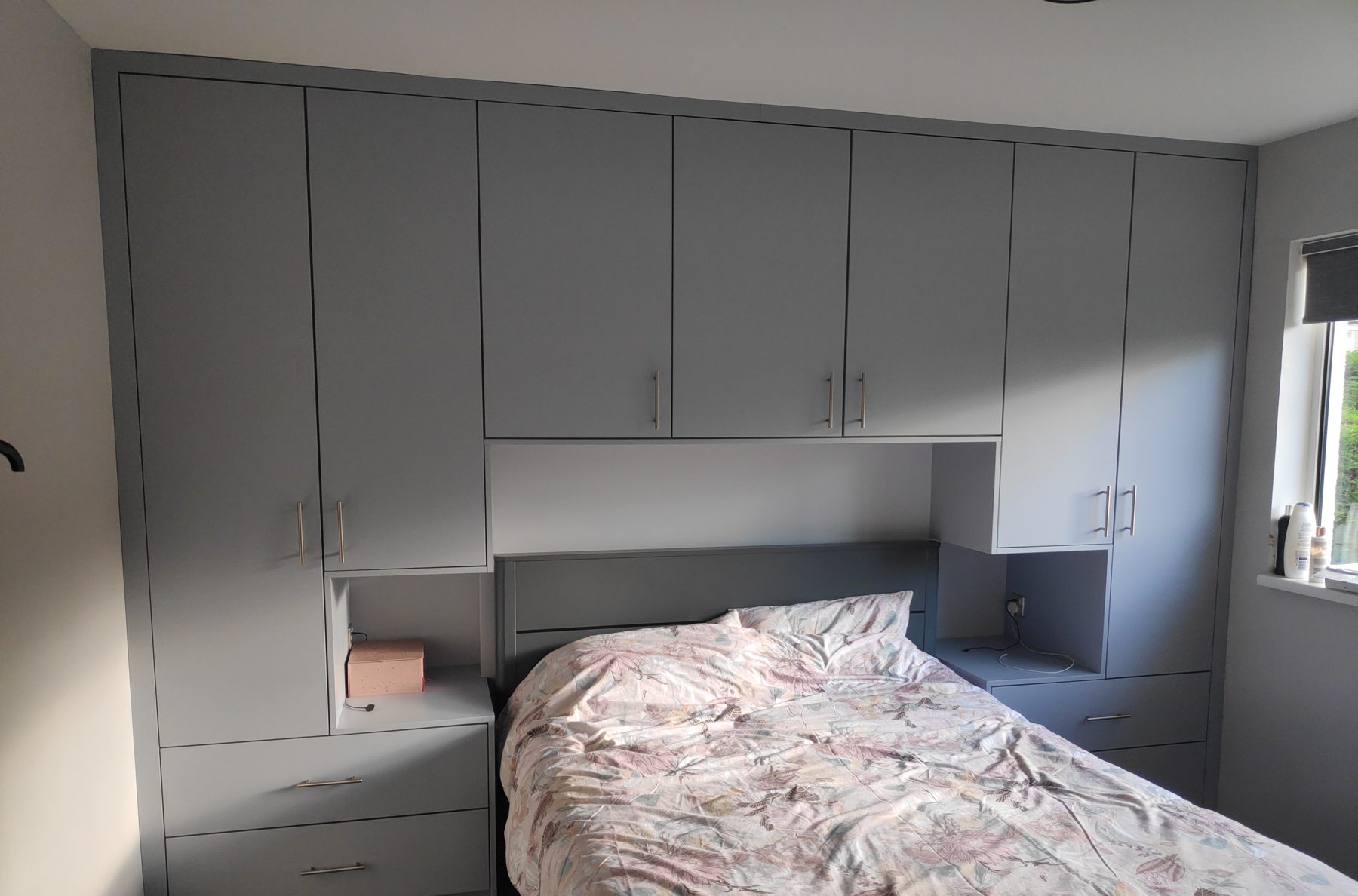 Grey overbed wardrobes Grey overbed wardrobes (finished) - fitted by Kitchen Hero