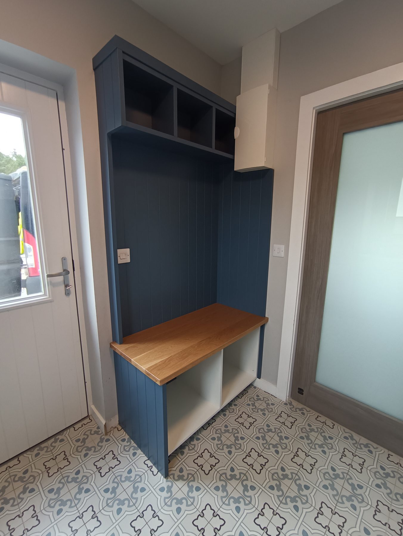 Navy hallway unit (finished) - fitted by Kitchen Hero