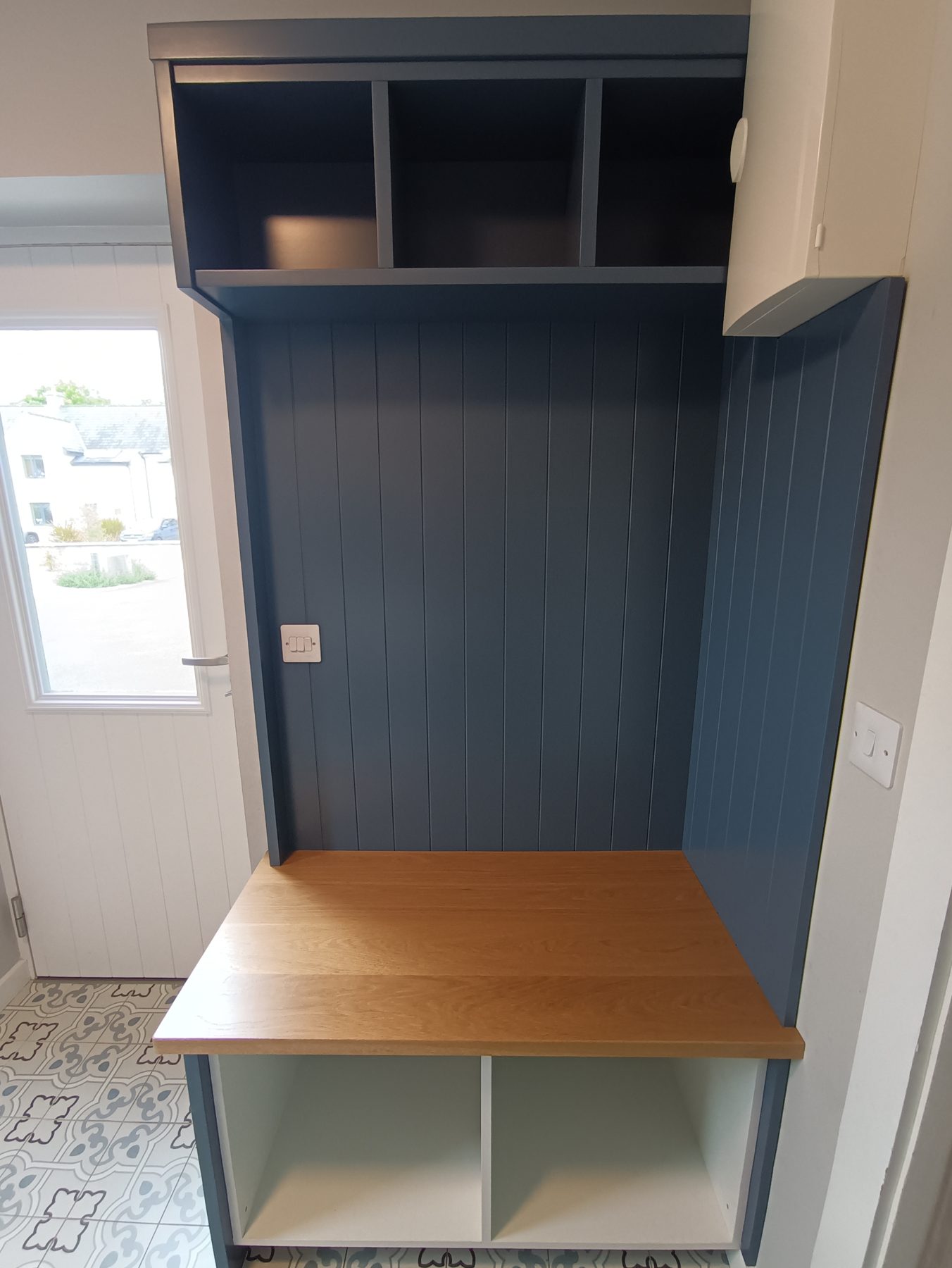Navy hallway unit (finished) - fitted by Kitchen Hero