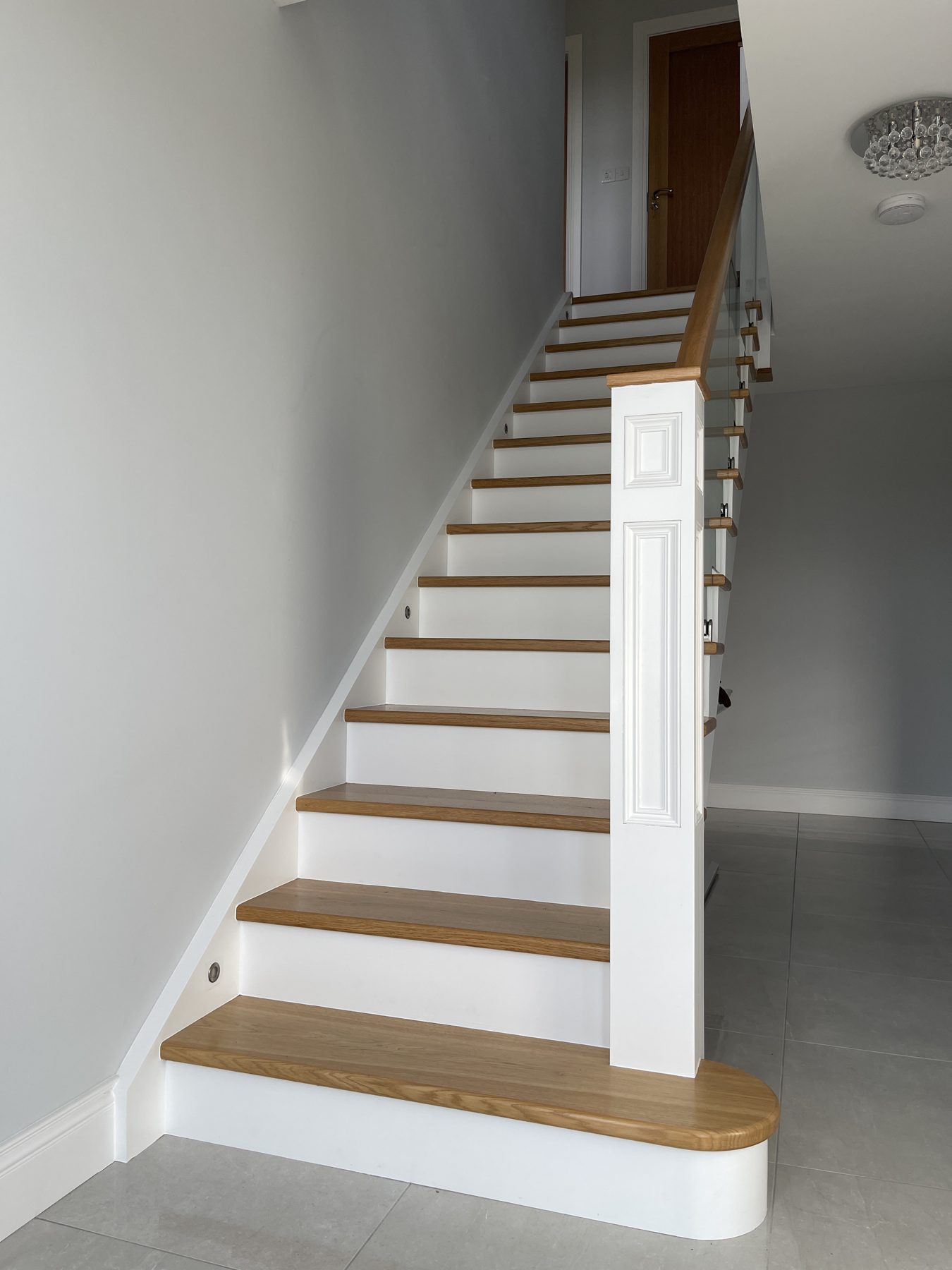 Oak and glass staircase (finished) - fitted by Kitchen Hero