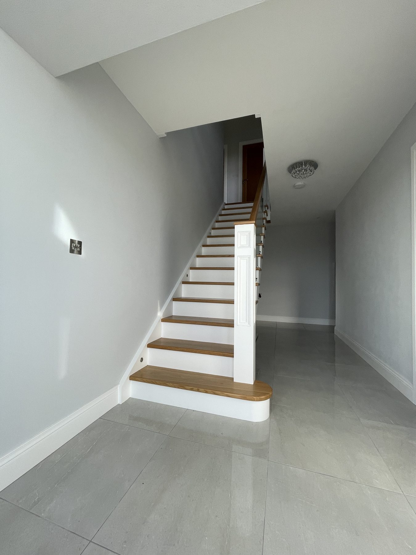 Oak and glass staircase Oak and glass staircase (finished) - fitted by Kitchen Hero