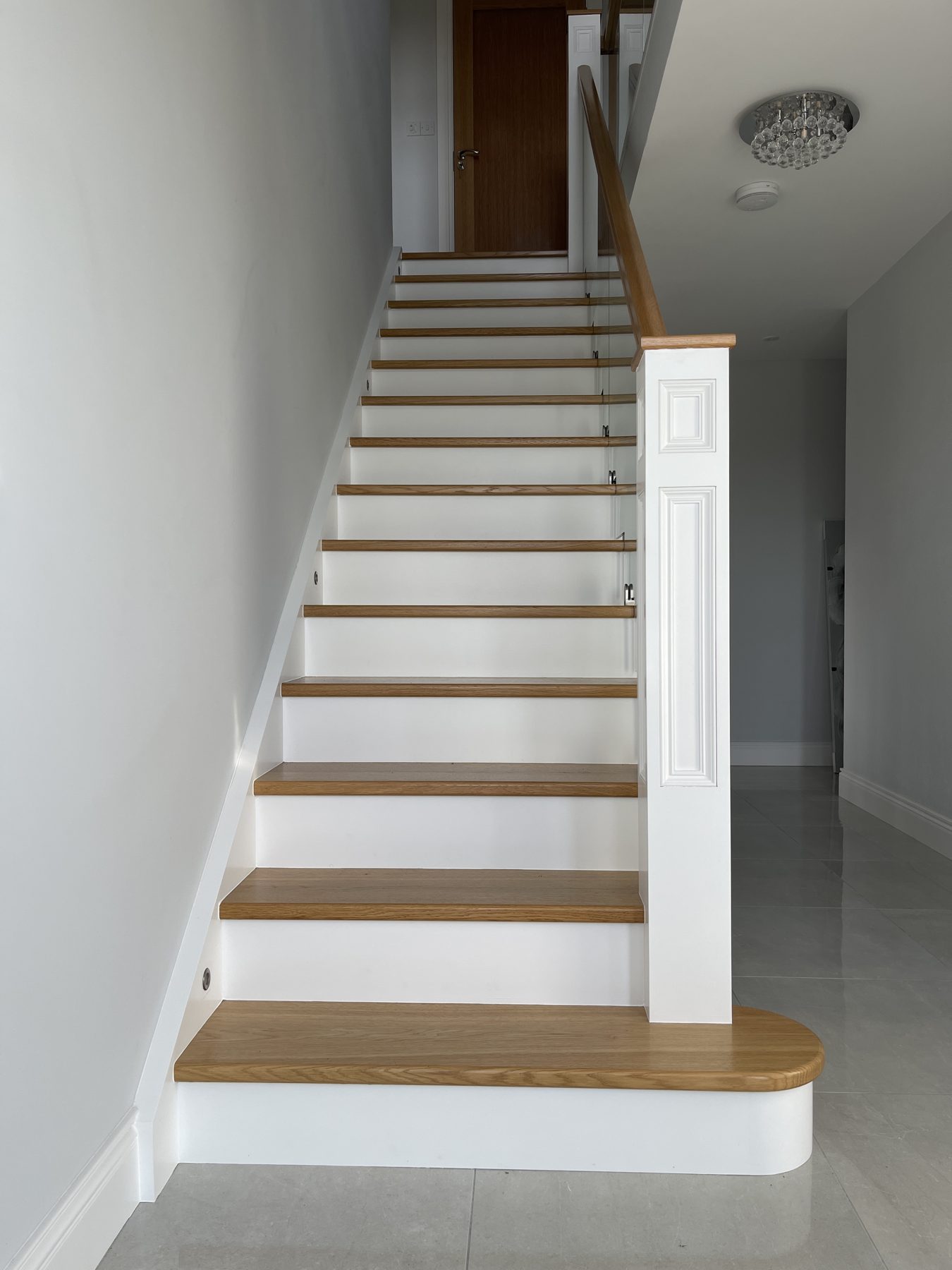 Oak and glass staircase Oak and glass staircase (finished) - fitted by Kitchen Hero