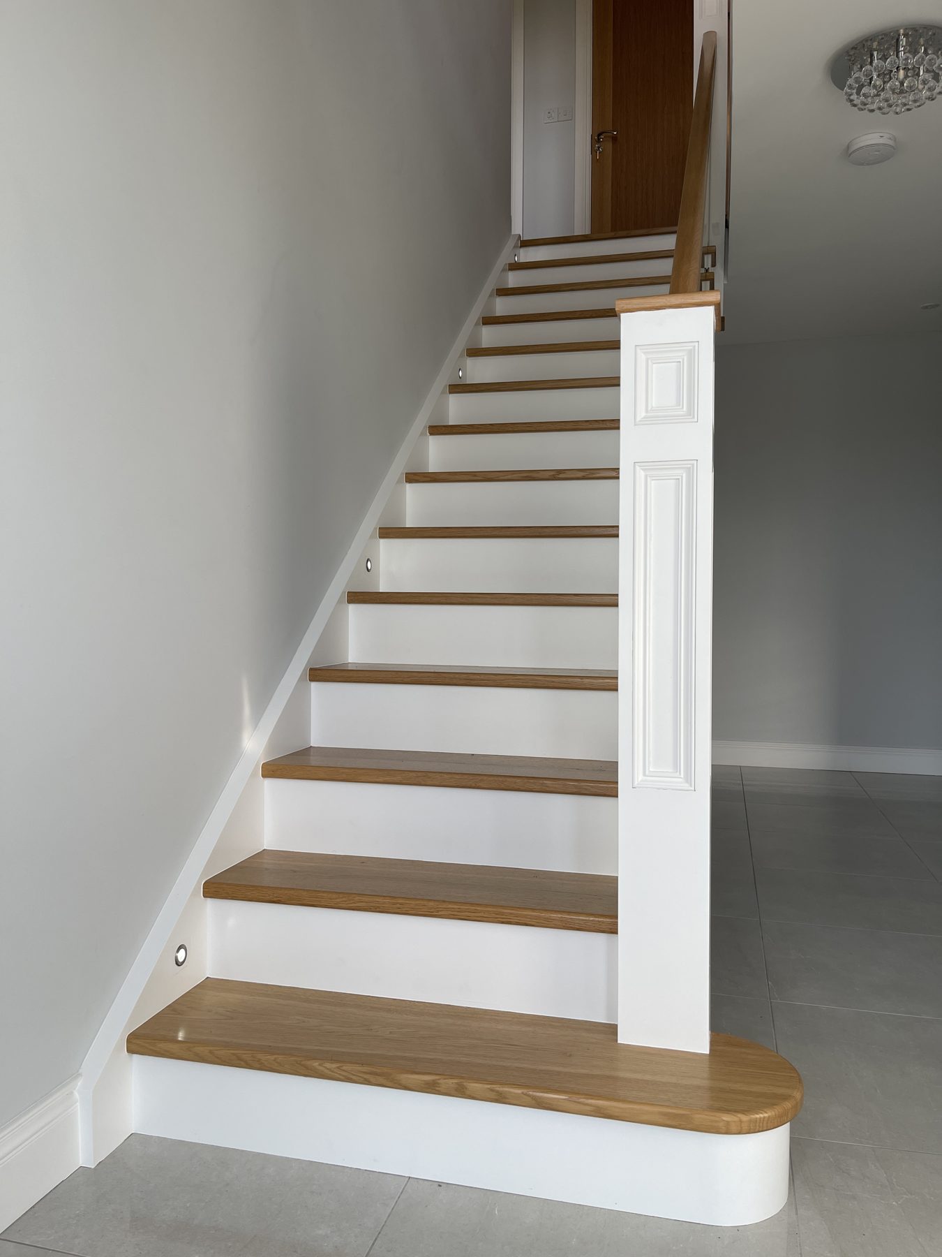Oak and glass staircase Oak and glass staircase (finished) - fitted by Kitchen Hero