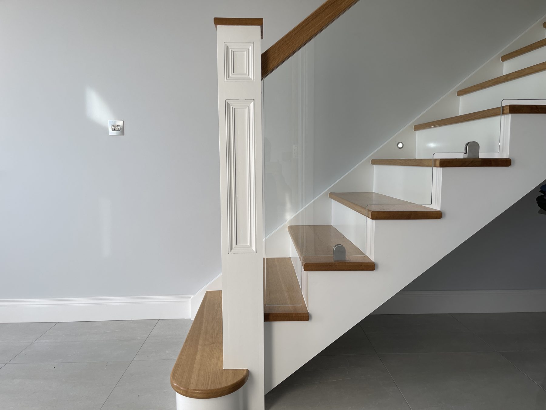 Oak and glass staircase Oak and glass staircase (finished) - fitted by Kitchen Hero