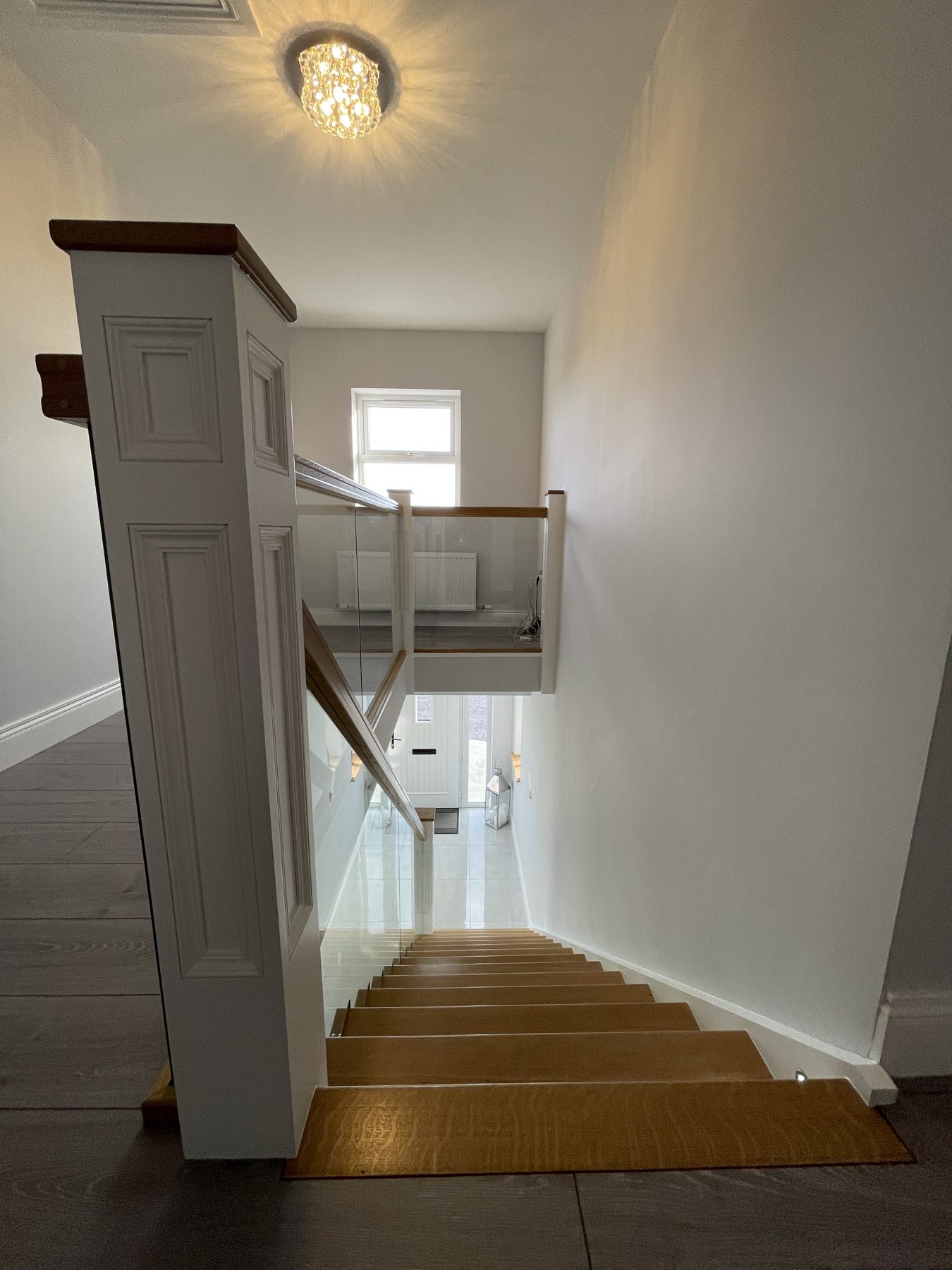 Oak and glass staircase Oak and glass staircase (finished) - fitted by Kitchen Hero