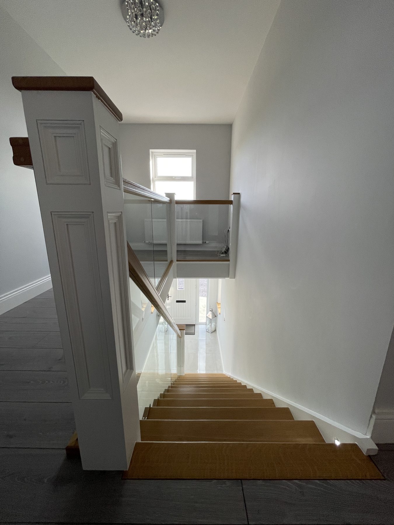 Oak and glass staircase Oak and glass staircase (finished) - fitted by Kitchen Hero