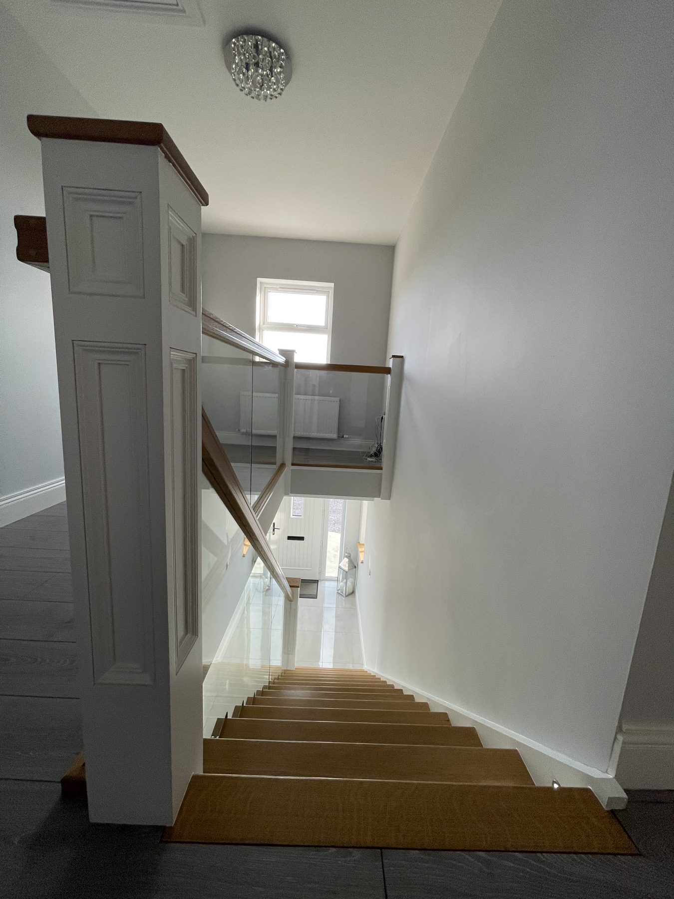 Oak and glass staircase Oak and glass staircase (finished) - fitted by Kitchen Hero
