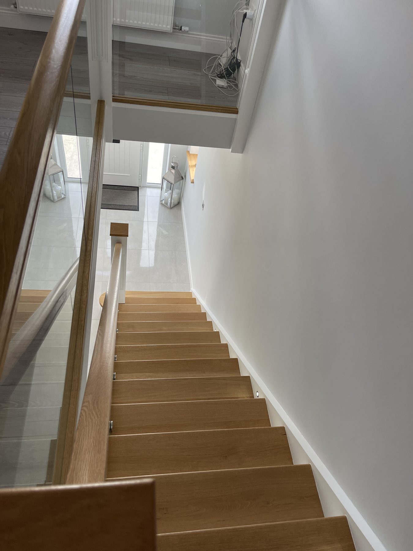 Oak and glass staircase Oak and glass staircase (finished) - fitted by Kitchen Hero