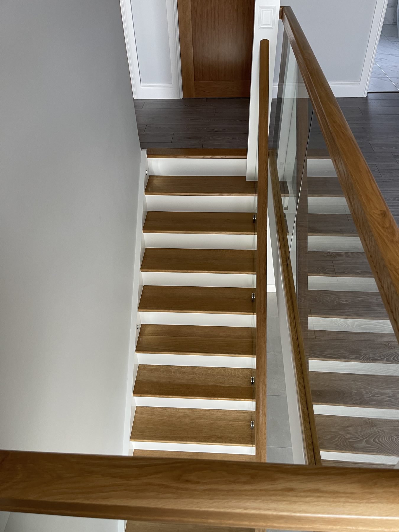 Oak and glass staircase Oak and glass staircase (finished) - fitted by Kitchen Hero