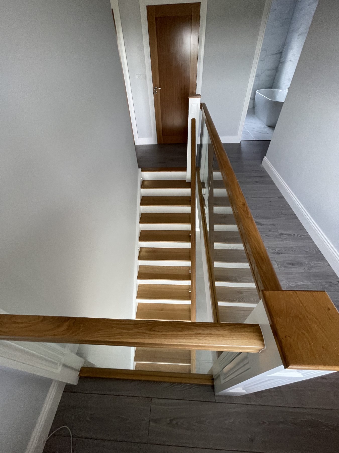 Oak and glass staircase Oak and glass staircase (finished) - fitted by Kitchen Hero