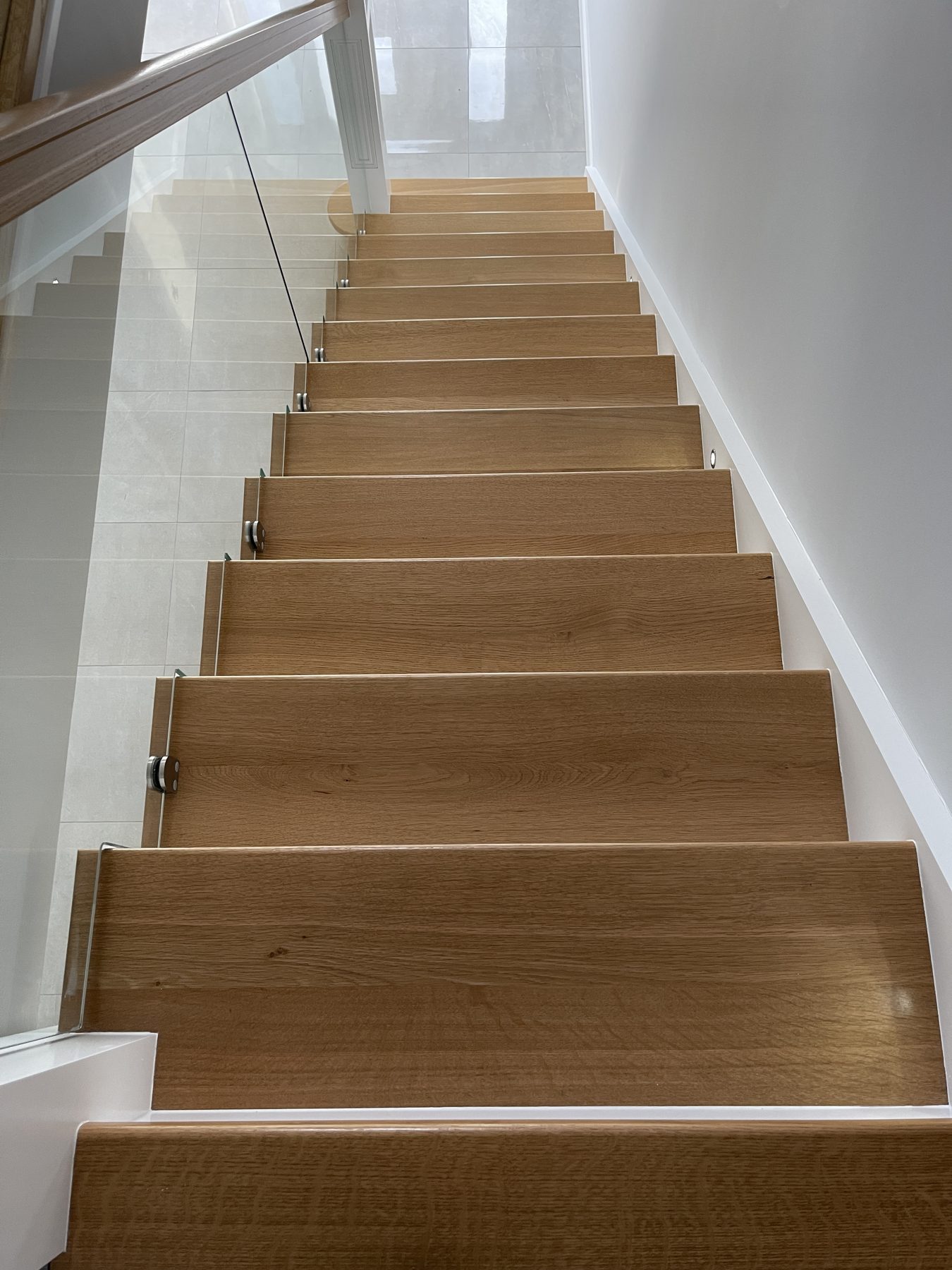Oak and glass staircase Oak and glass staircase (finished) - fitted by Kitchen Hero