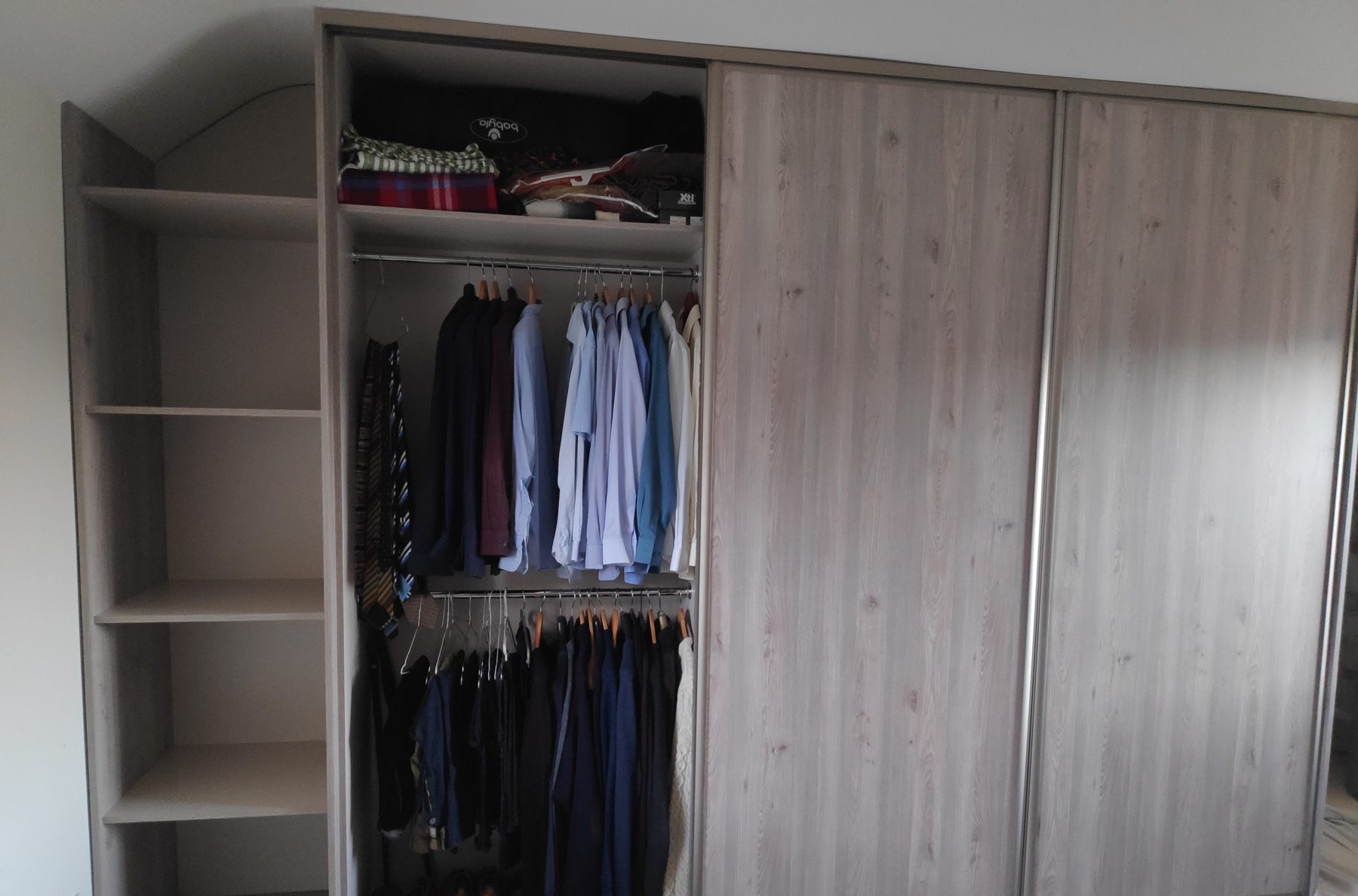 Oak sliding wardrobe under the slope Oak sliding wardrobe under the slope (finished) - fitted by Kitchen Hero