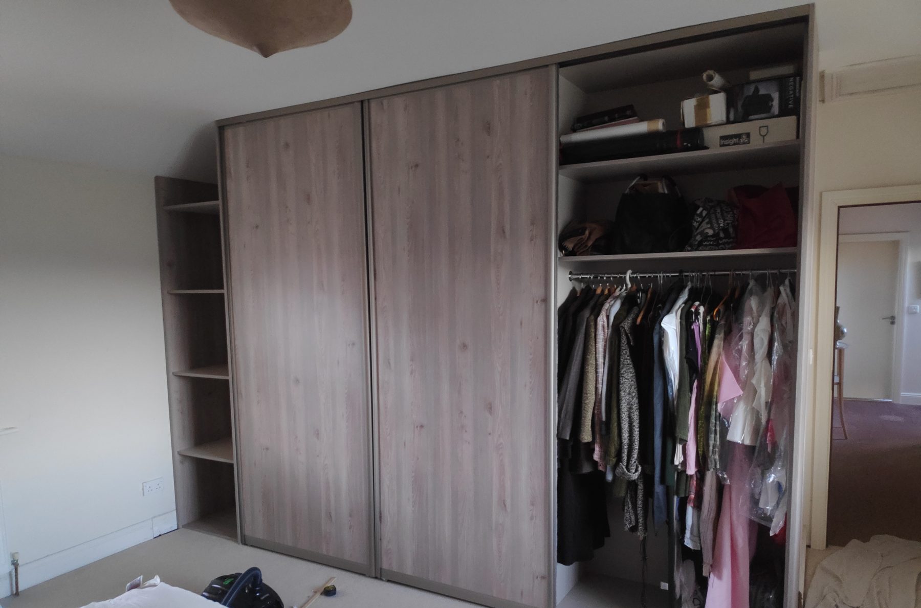 Oak sliding wardrobe under the slope Oak sliding wardrobe under the slope (finished) - fitted by Kitchen Hero
