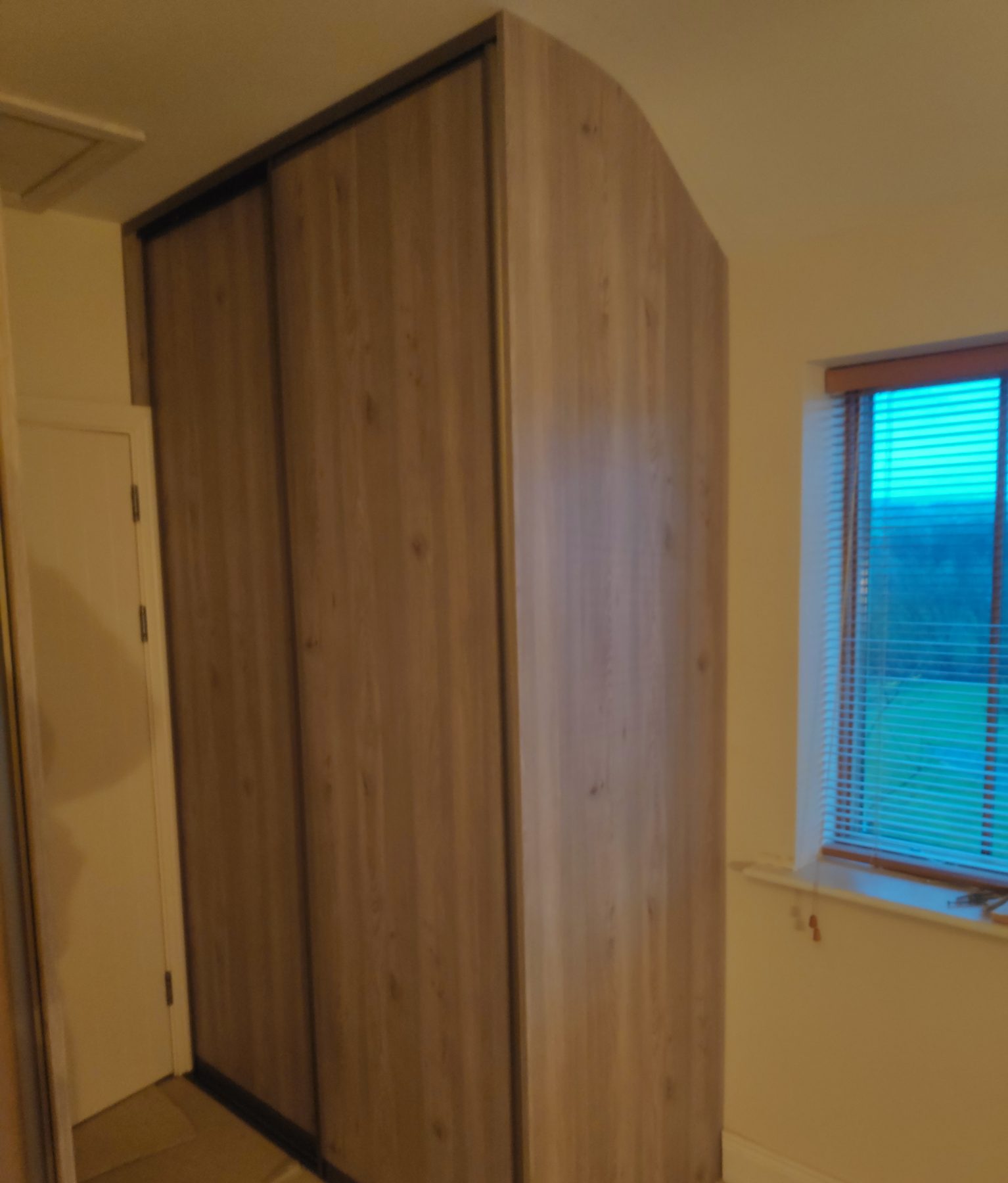 Oak sliding wardrobe under the slope Oak sliding wardrobe under the slope (finished) - fitted by Kitchen Hero