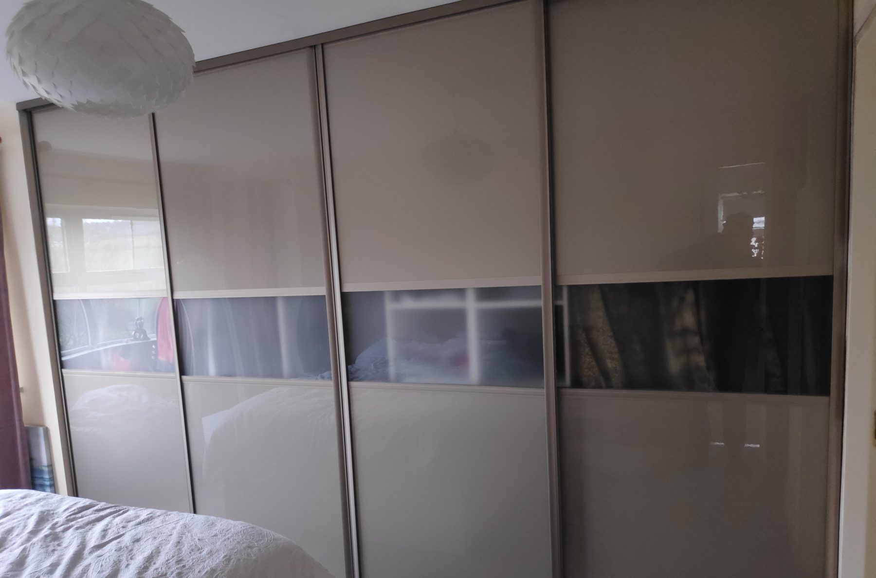 Taupe gloss sliding wardrobe (finished) - fitted by Kitchen Hero