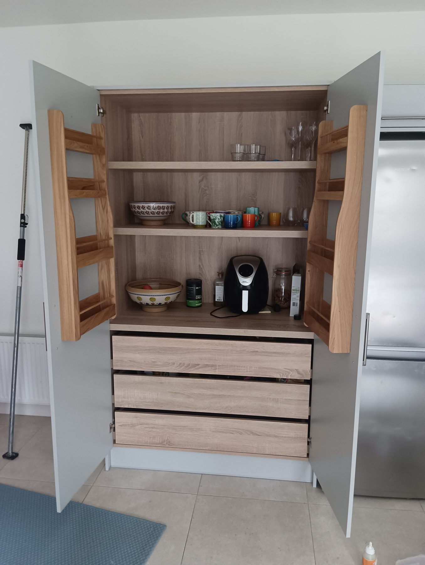 White gloss larder White gloss larder (finished) - fitted by Kitchen Hero