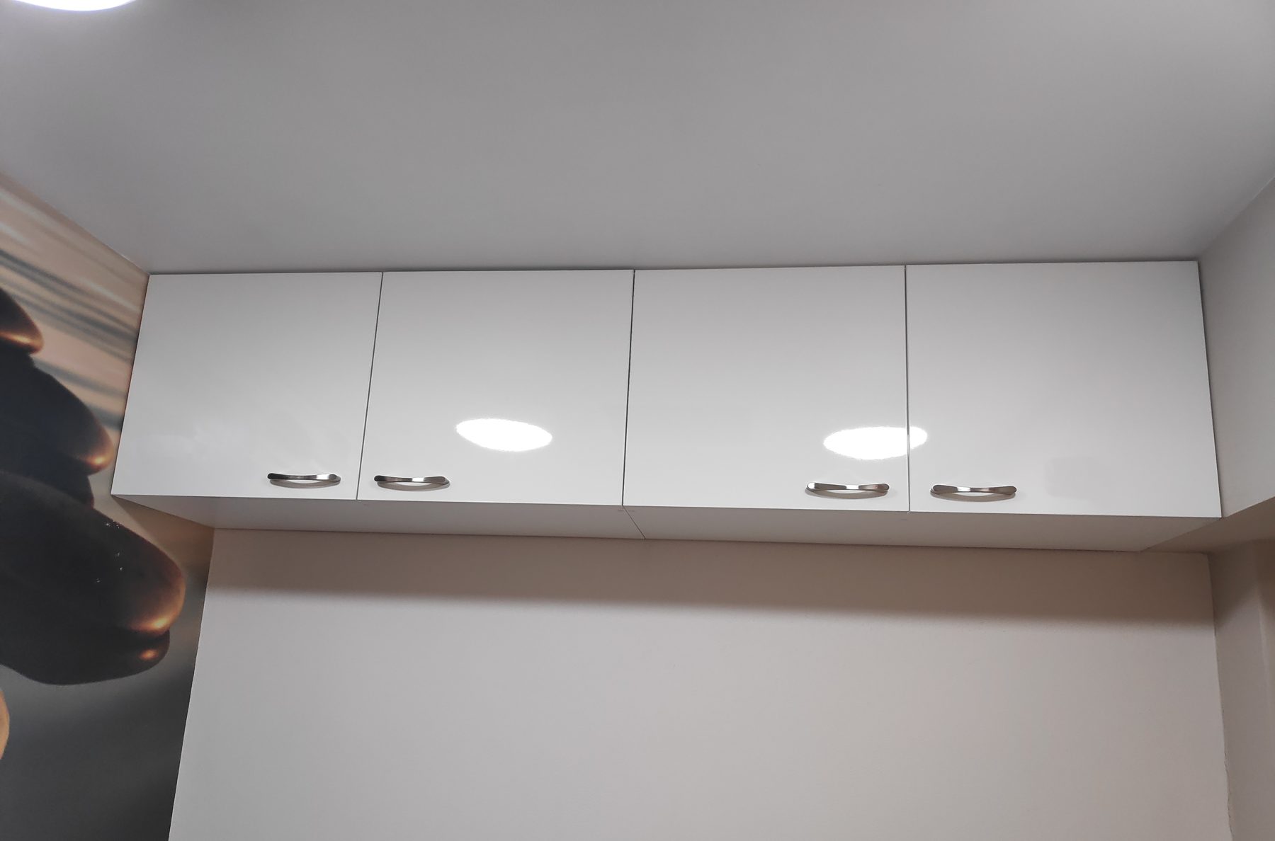 White gloss overhead cabinets White gloss overhead cabinets (finished) - fitted by Kitchen Hero