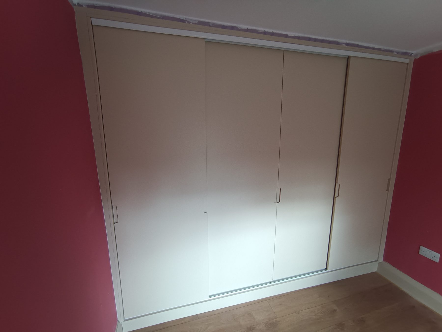 White sliding wardrobe White sliding wardrobe (finished) - fitted by Kitchen Hero