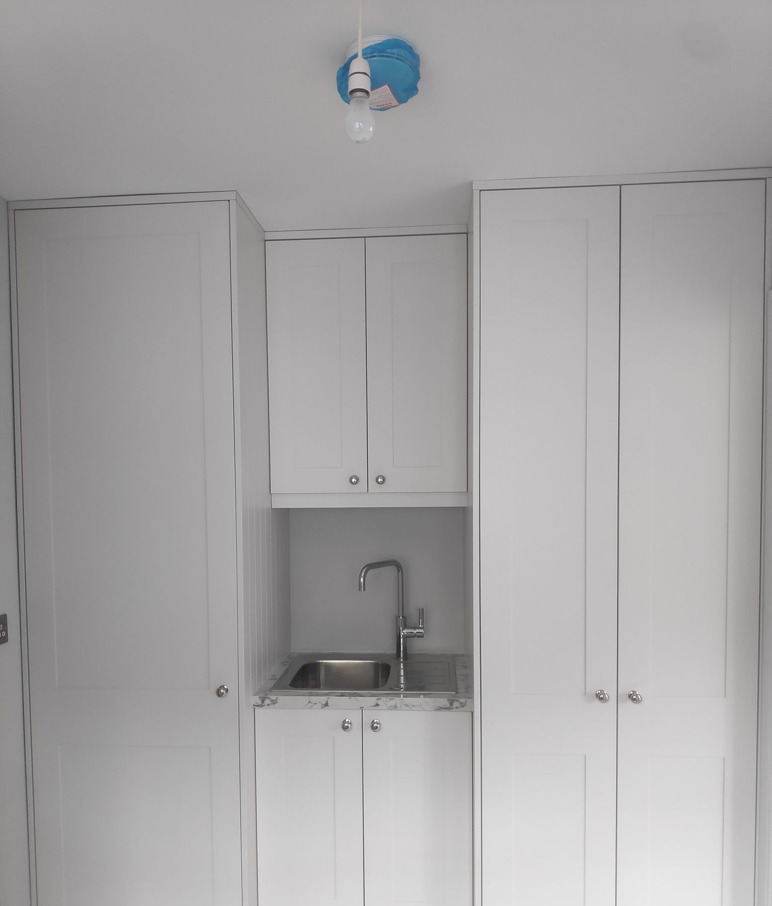 White utility room (finished) - fitted by Kitchen Hero