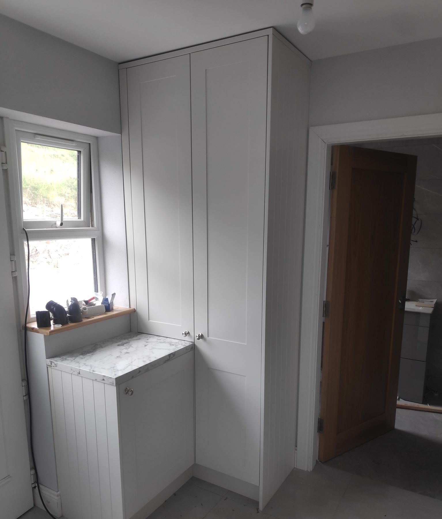 White utility room (finished) - fitted by Kitchen Hero