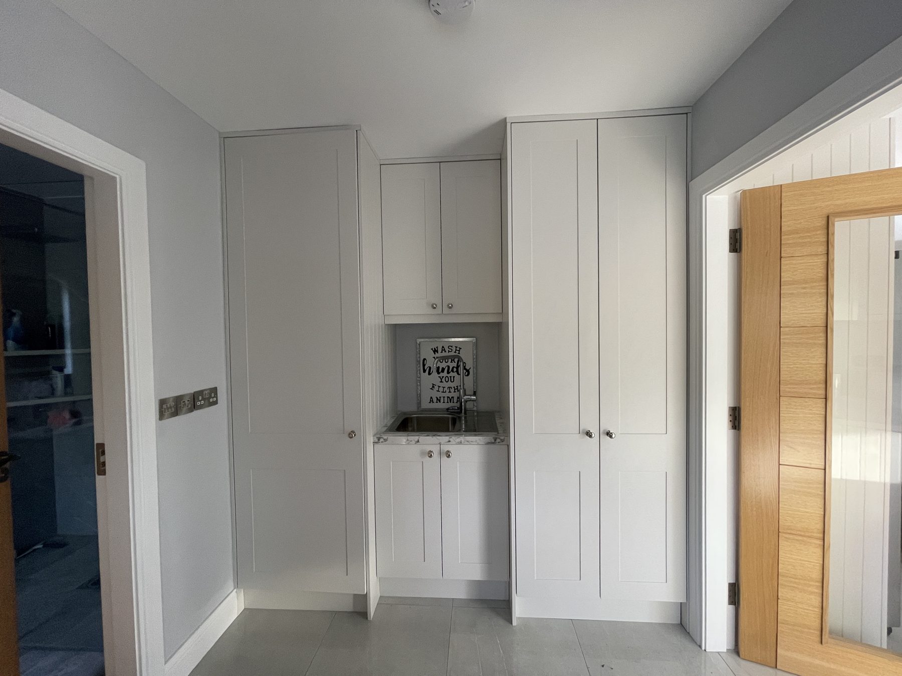 White utility room (finished) - fitted by Kitchen Hero