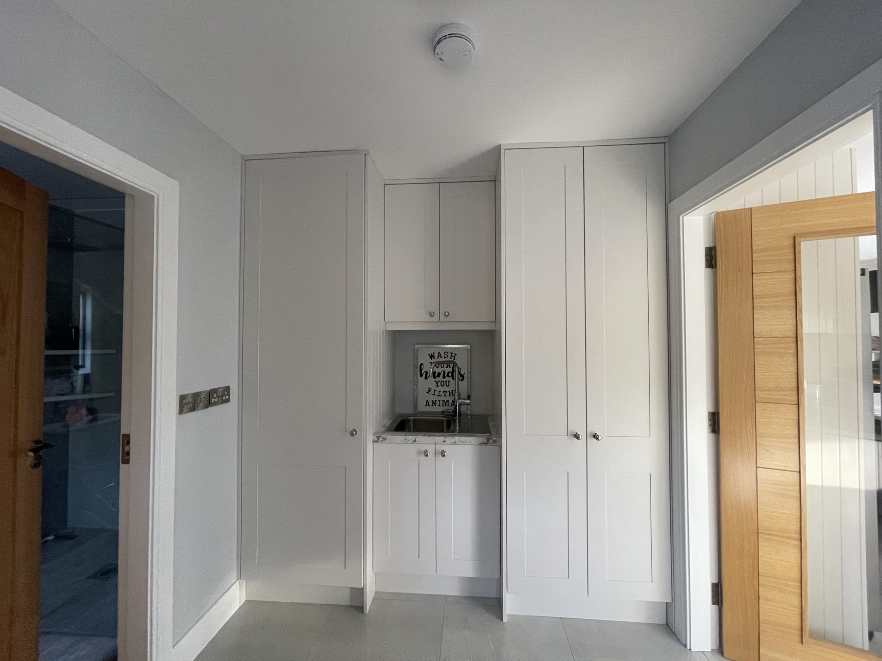 White utility room (finished) - fitted by Kitchen Hero