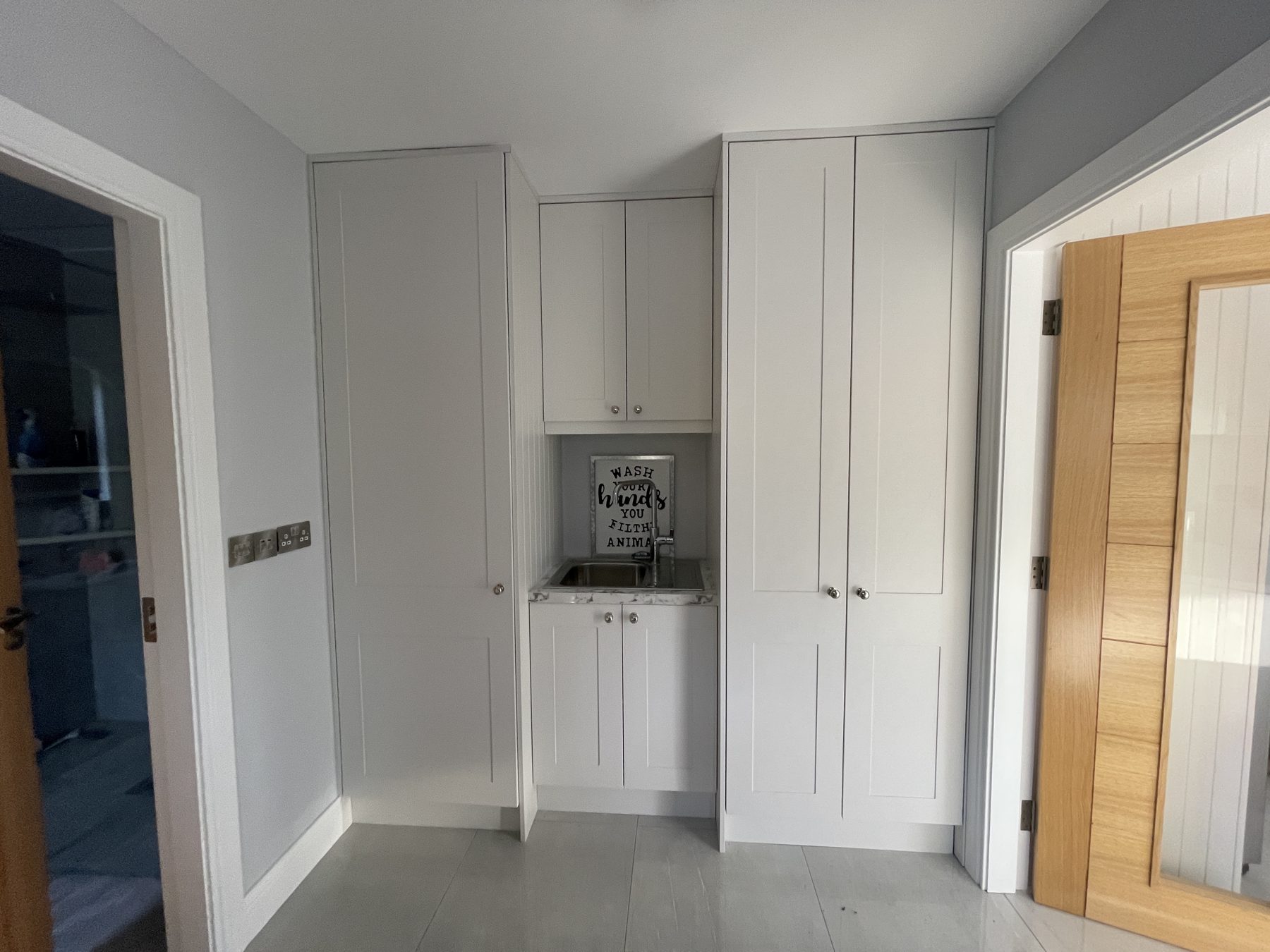 White utility room (finished) - fitted by Kitchen Hero