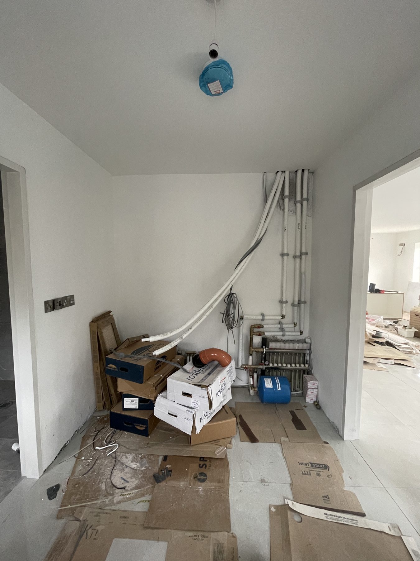 White utility room (before) - fitted by Kitchen Hero