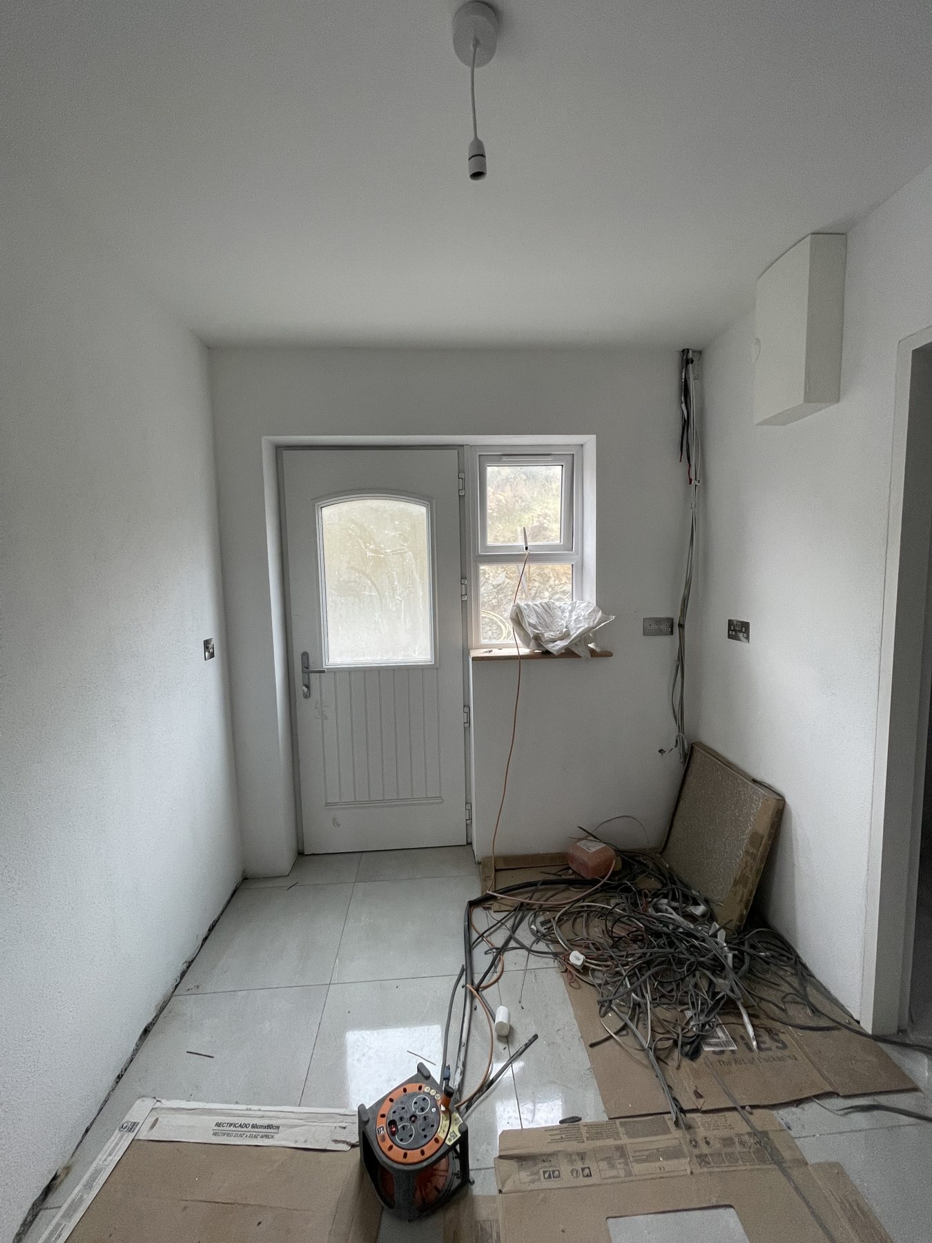 White utility room (before) - fitted by Kitchen Hero