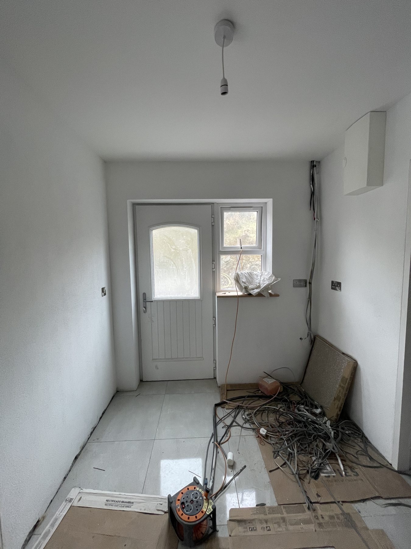 White utility room (before) - fitted by Kitchen Hero