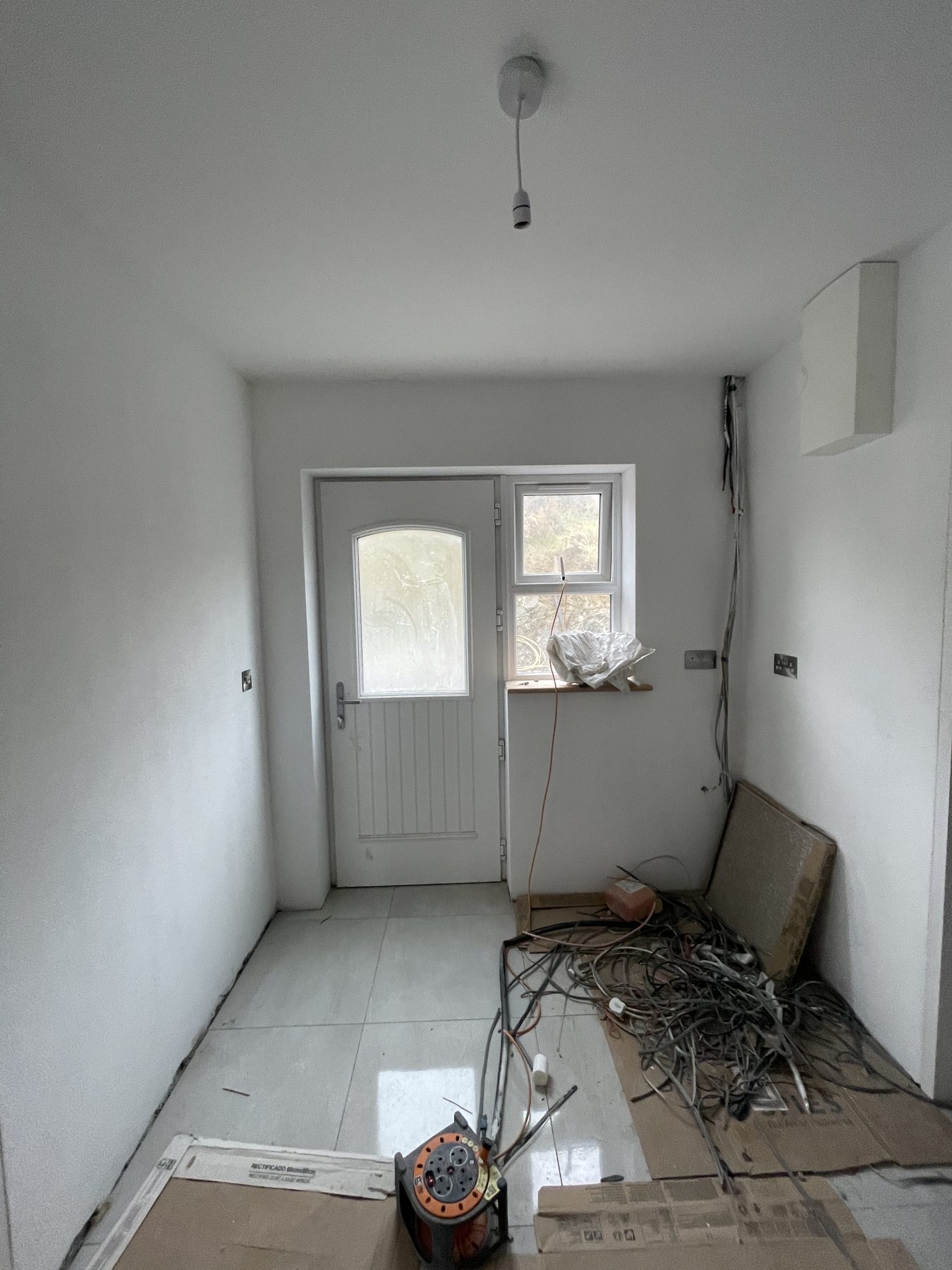 White utility room (before) - fitted by Kitchen Hero
