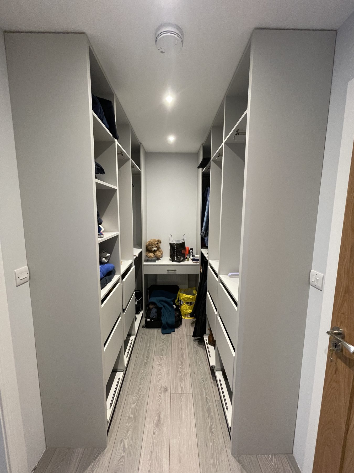 White walk-in wardrobe White walk-in wardrobe (finished) - fitted by Kitchen Hero
