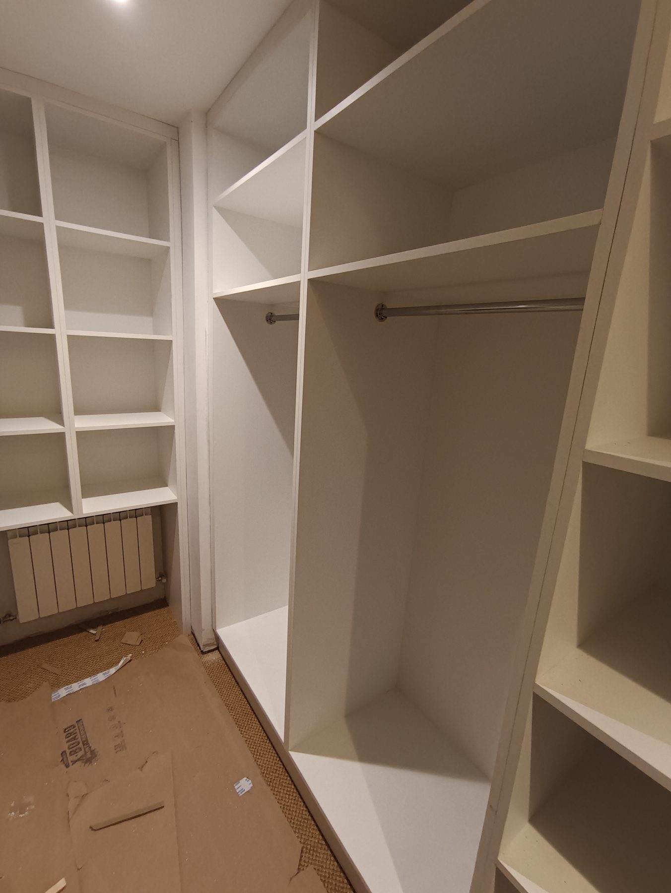 White walk-in wardrobe White walk-in wardrobe (mid-fit) - fitted by Kitchen Hero