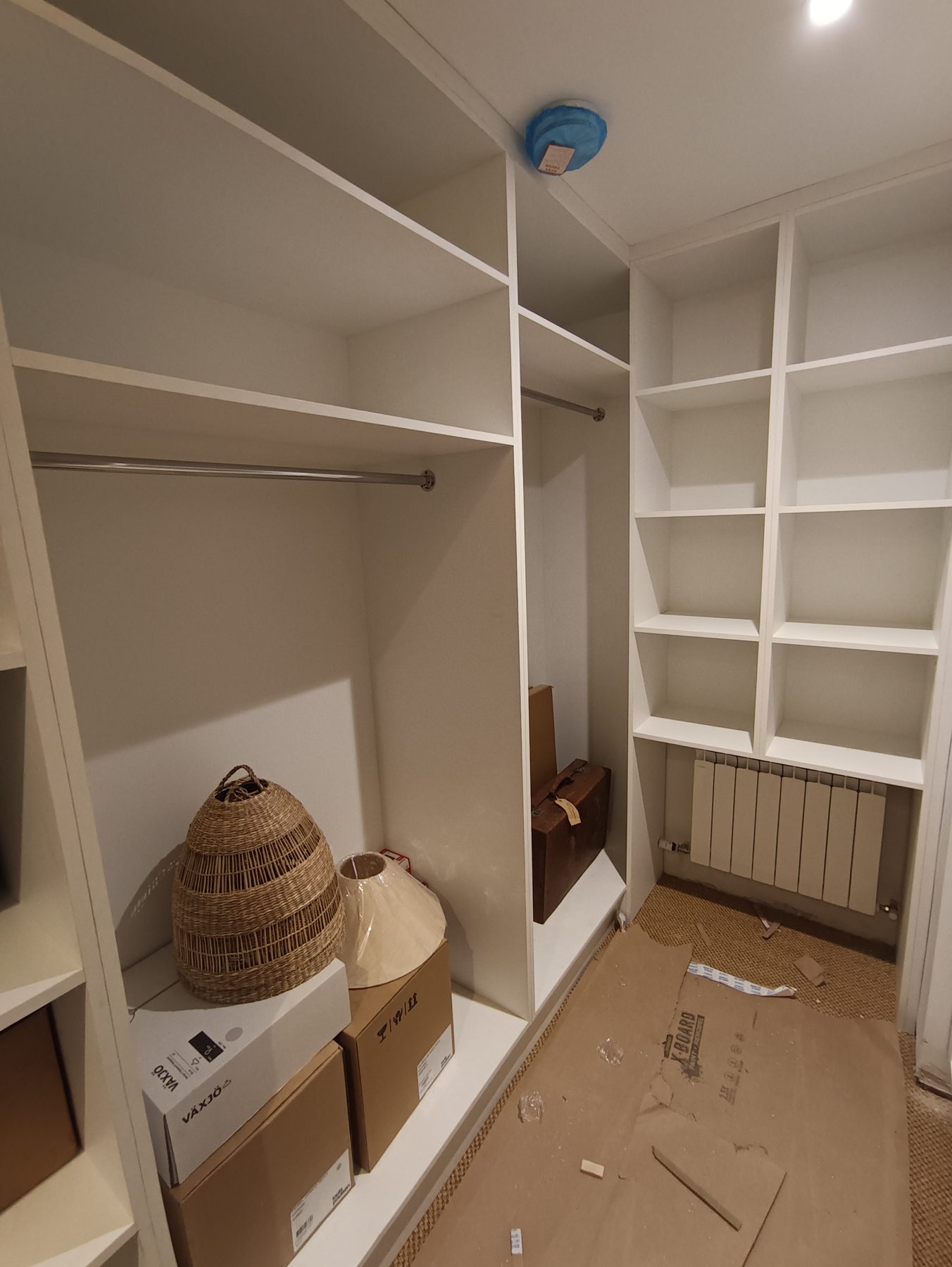 White walk-in wardrobe White walk-in wardrobe (mid-fit) - fitted by Kitchen Hero
