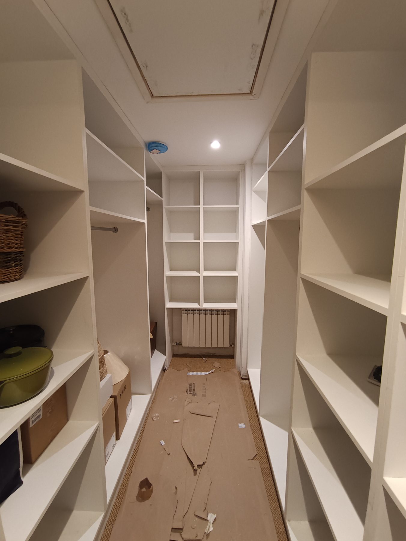 White walk-in wardrobe White walk-in wardrobe (mid-fit) - fitted by Kitchen Hero